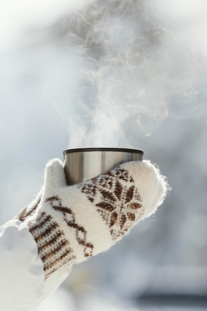 Free Photo close up hands holding cup