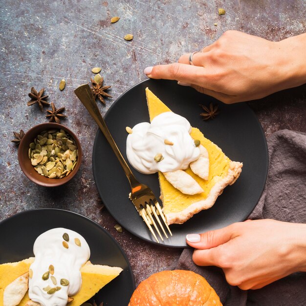 Close-up hands holding pie plate