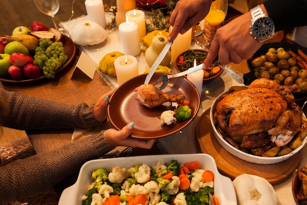 Close-up hands holding plate