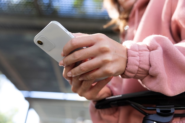 Close up hands holding smartphone