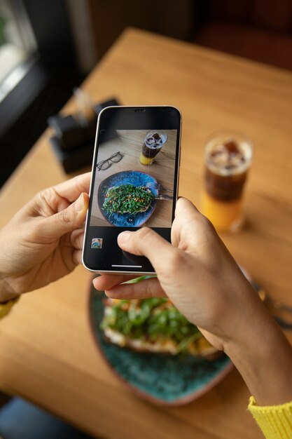 Close up hands holding smartphone