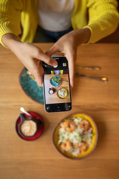 Close up hands holding smartphone