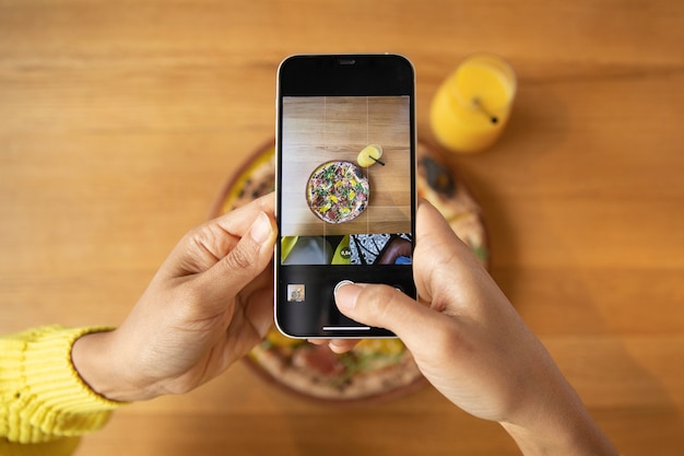 Close up hands holding smartphone