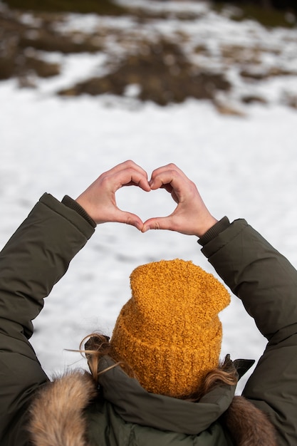 Free Photo close up hands making heart shape