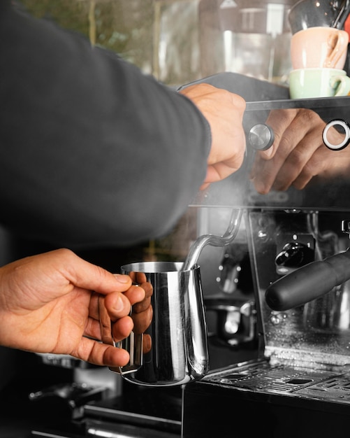 Close-up hands preparing beverage