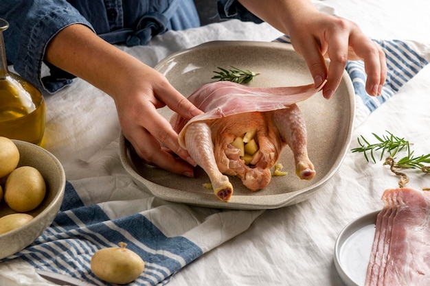 Close-up hands preparing meal