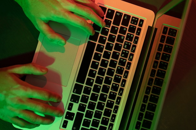 Free photo close up on hands typing on key board