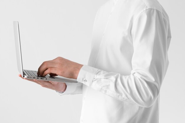 Close up hands typing on keyboard