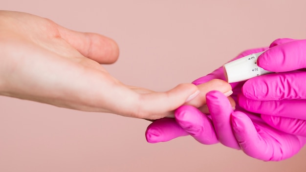 Close-up hands wearing gloves