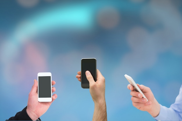 Free photo close-up of hands with smartphones