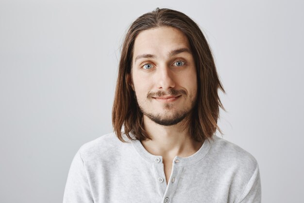 Close-up of handsome caucasian guy smiling