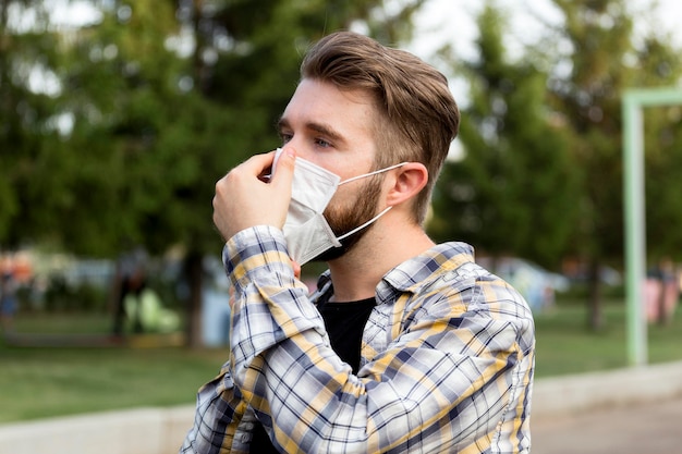 Close-up handsome male wearing face mask