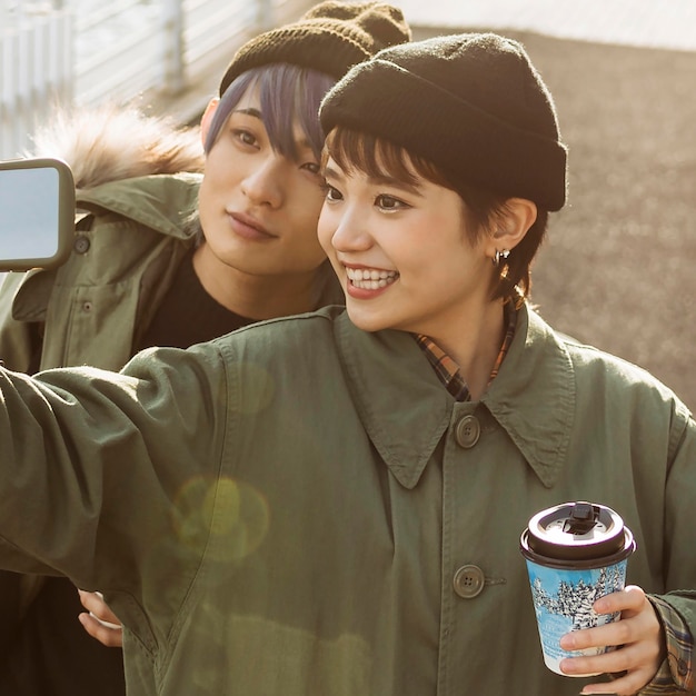 Free Photo close-up happy couple taking selfie