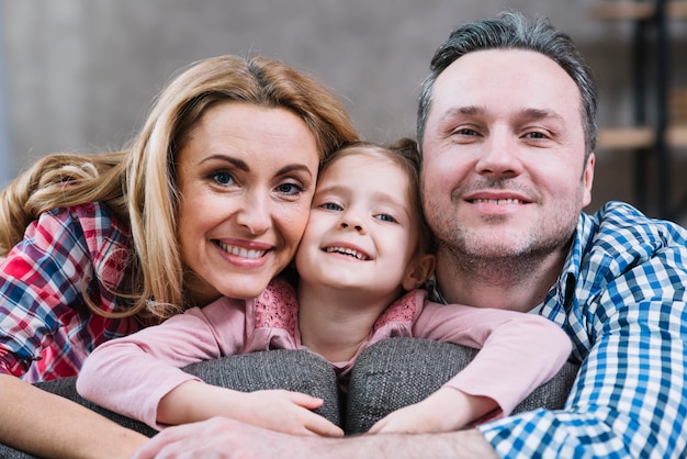 Free photo close-up of happy family looking at camera