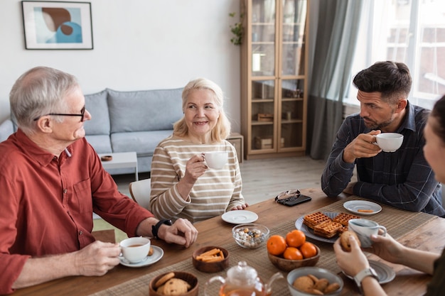 Free Photo close up happy family at table