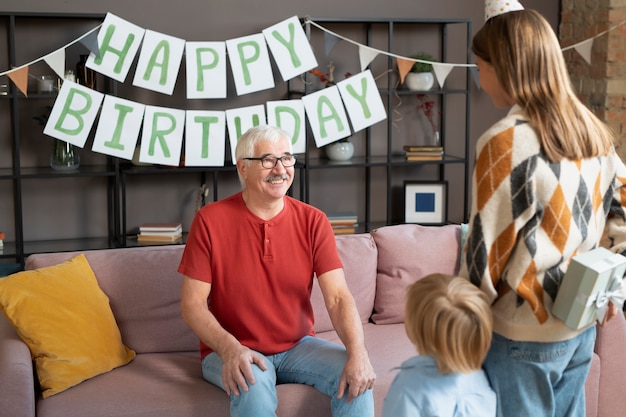 Free photo close up happy family with present