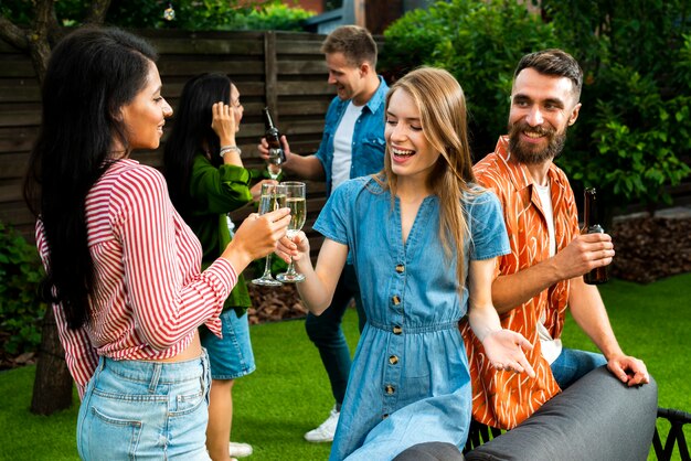 Close-up happy friends together toasting