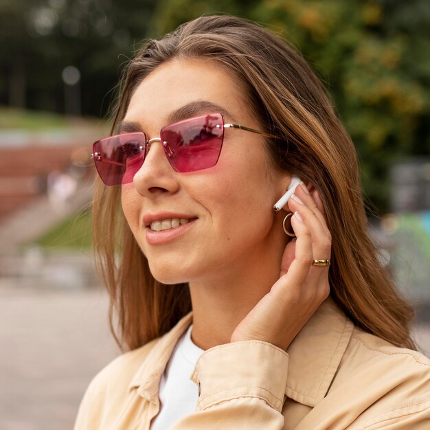 Close-up happy girl with earphones