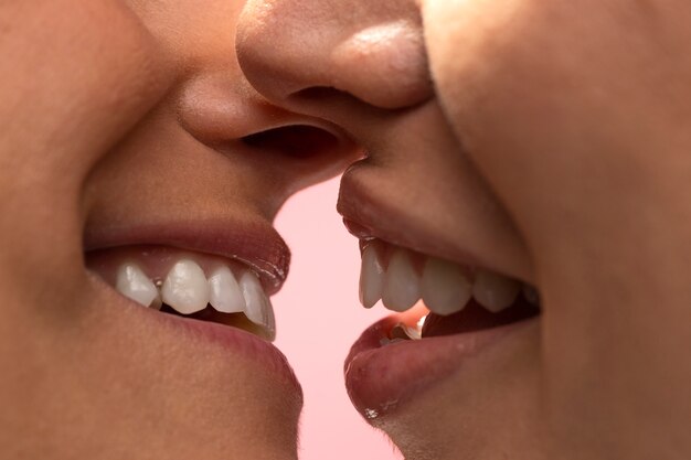 Close up happy people kissing