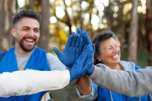 Free photo close up happy people working together