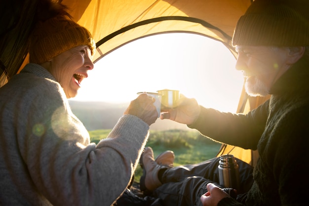 Free Photo close up happy senior people in tent