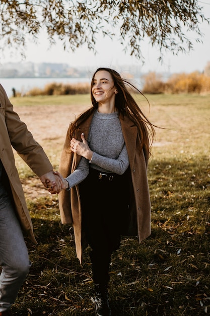 Free photo close-up happy woman holding partner