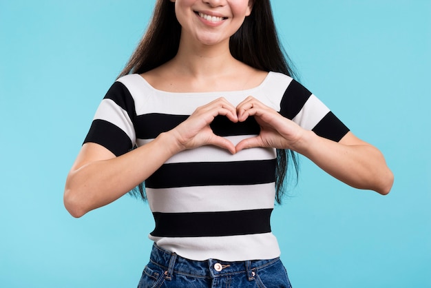 Close-up heart shape with hands