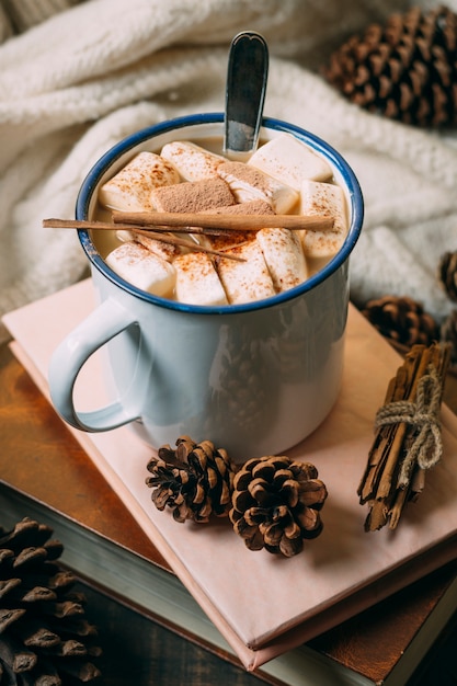 Close-up hot chocolate with books