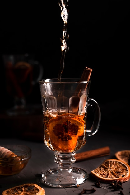 Close-up of hot pouring tea