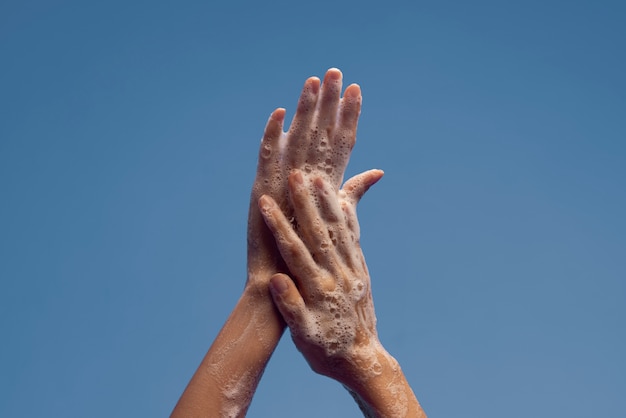 Free photo close up on hygienic hand washing