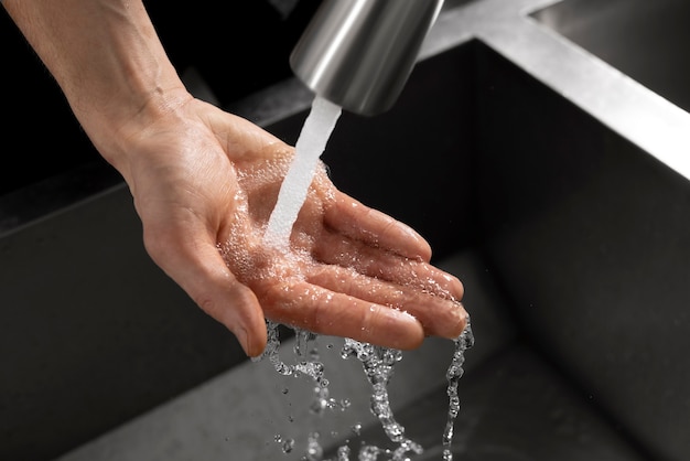 Free photo close up on hygienic hand washing