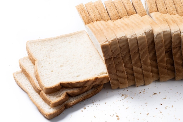 Free photo close up image of cut of loaf bread isolated on white background