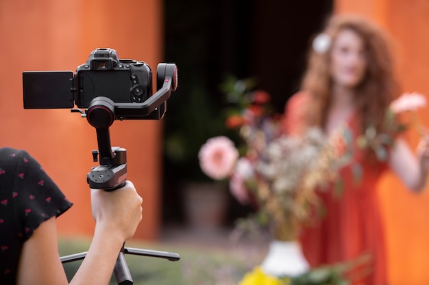 Close up influencer holding flowers