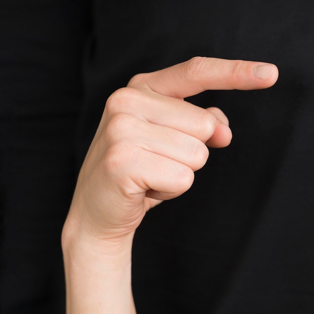 Close-up interpreter teaching sign language