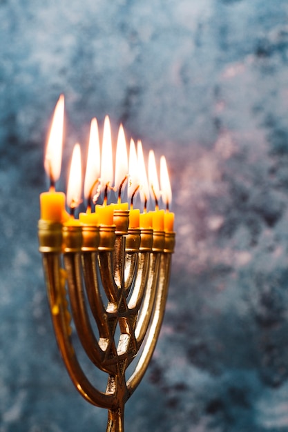 Free Photo close-up jewish candleholder burning