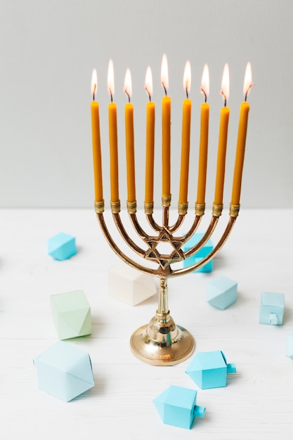 Free Photo close-up jewish candleholder for hanukkah