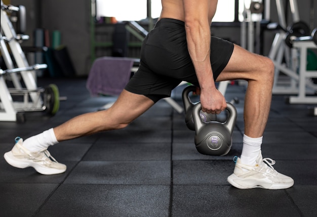 Close up kettlebells workout at gym