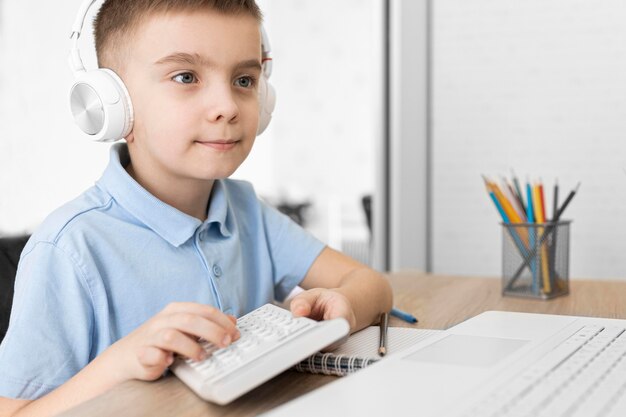 Close up kid holding calculator