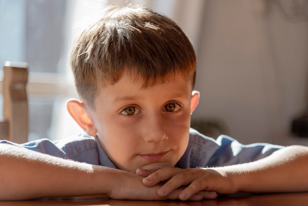 Close up  kid laying on table