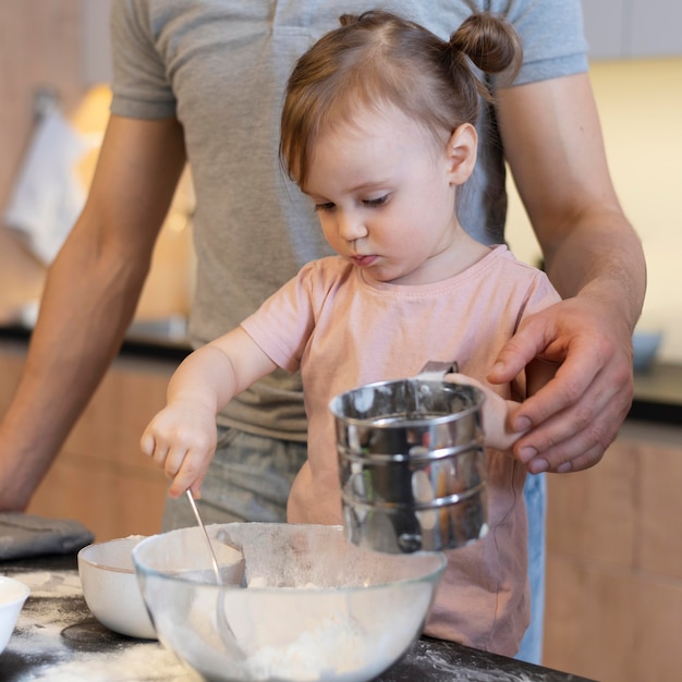 Free Photo close-up kid mixing with spoon