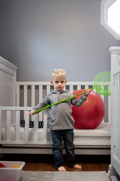 Close up on kid playing indoors