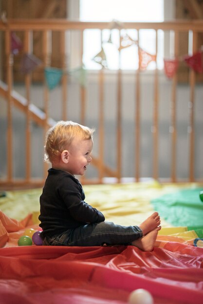 Close up on kid playing indoors