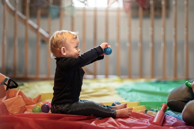 Close up on kid playing indoors