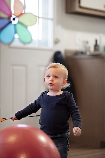 Close up on kid playing indoors