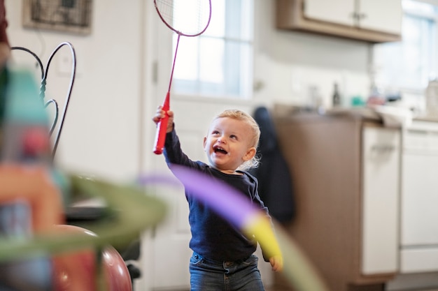 Free Photo close up on kid playing indoors