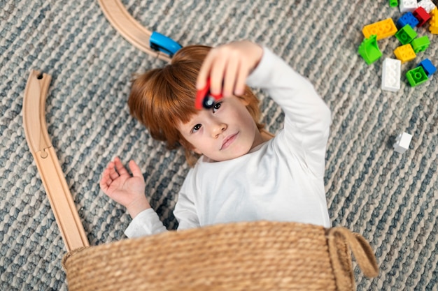 Free photo close up on kid in their room having fun