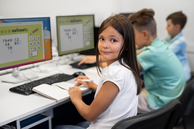 Close up on kid while having technology education class