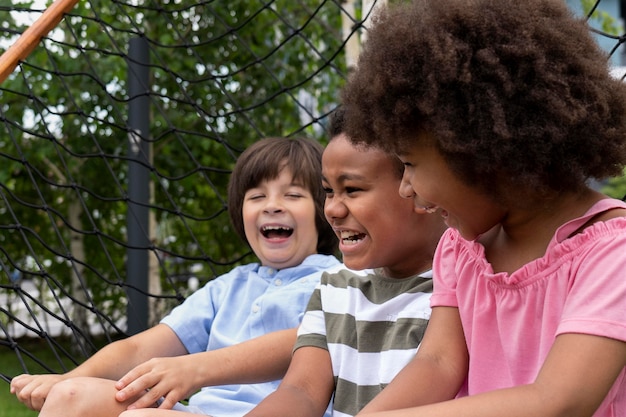 Close up kids laughing outdoors