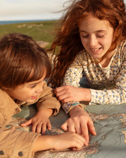 Close-up kids looking at map