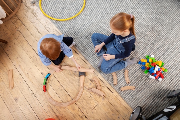 Close up on kids in their room having fun